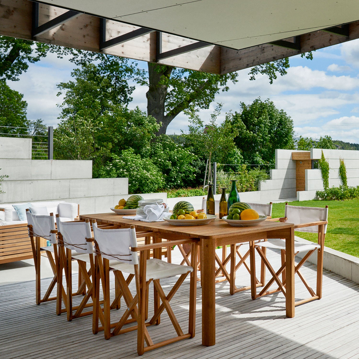 Kryss loungefåtölj teak 