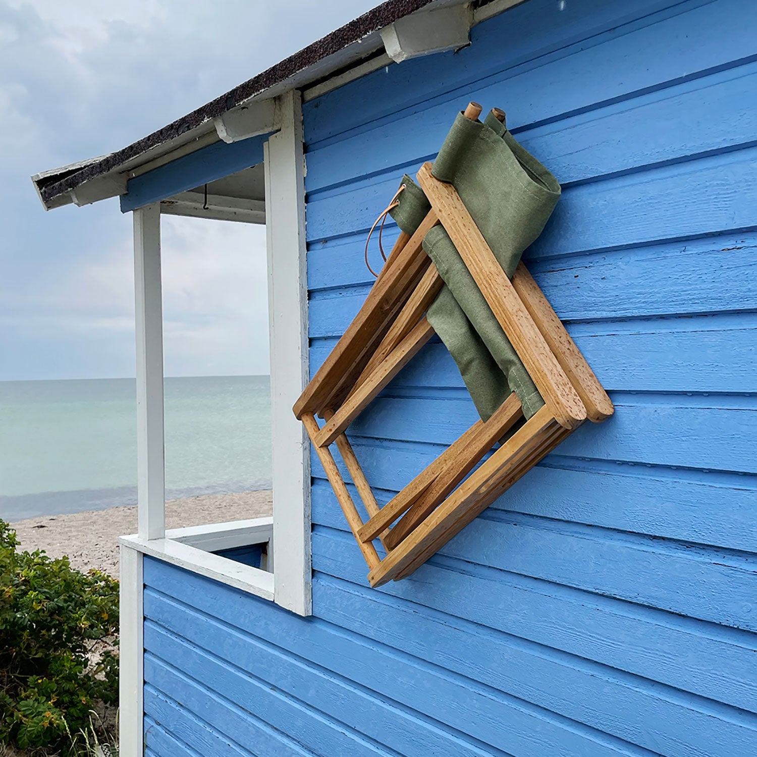 Kryss loungefåtölj teak 