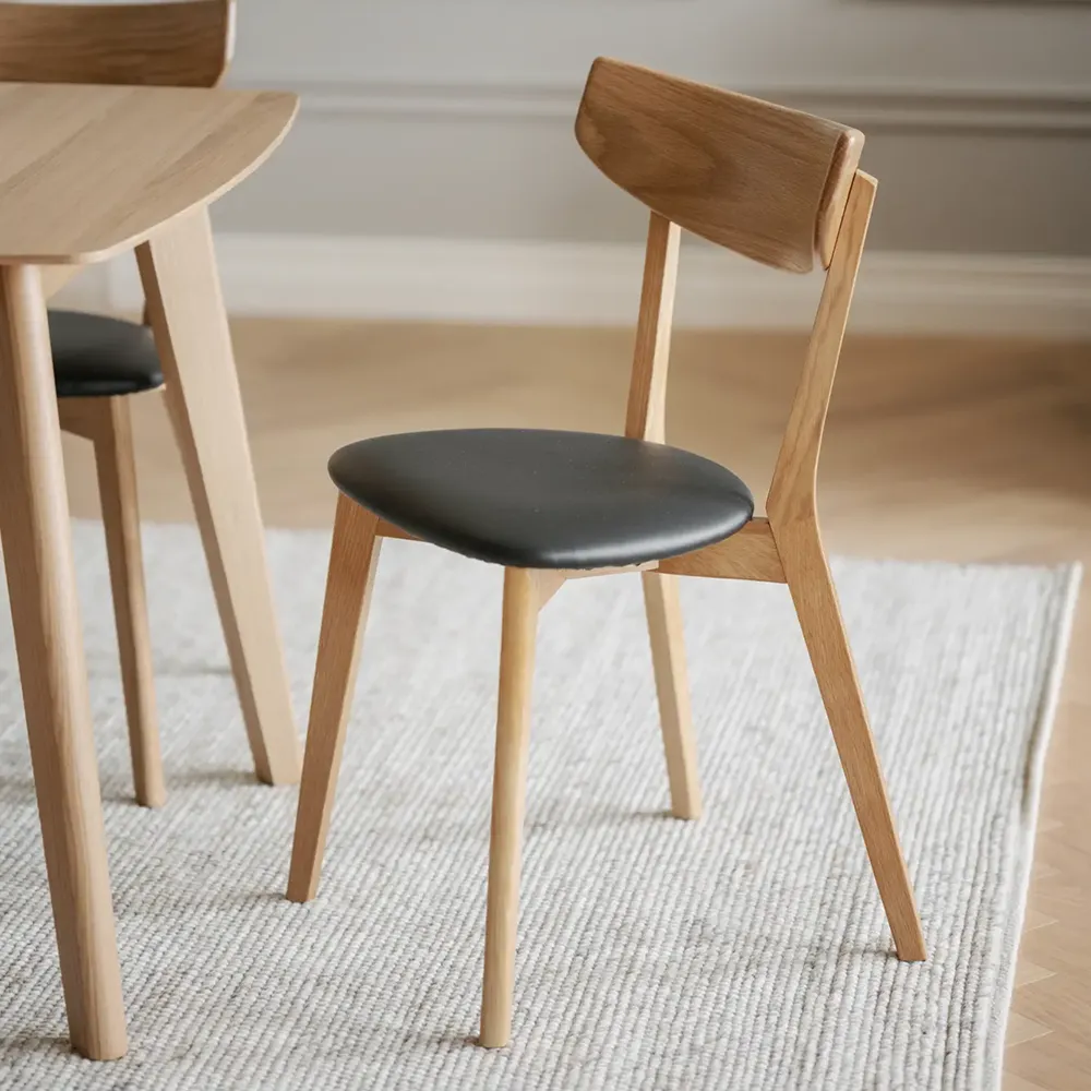 Ami matstol ek/svart konstläder